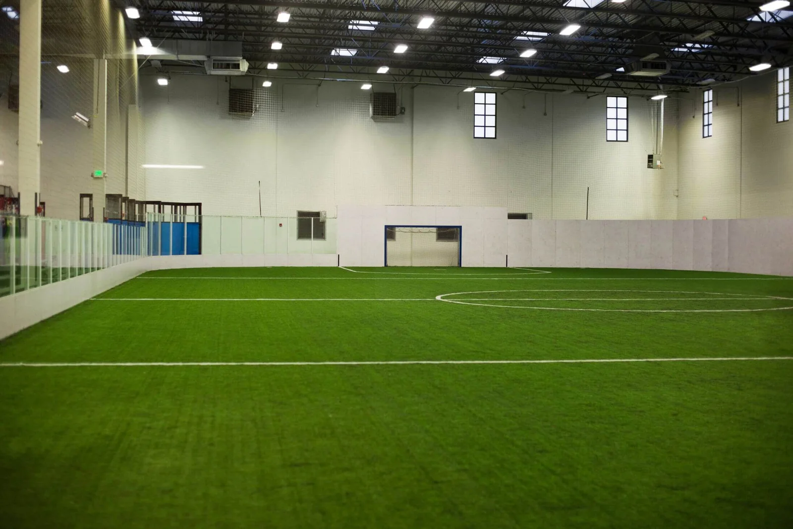 An indoor facility with indoor artificial grass installed by Surprise Artificial Grass Co